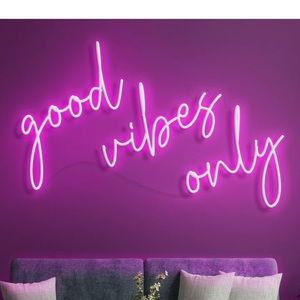 “Good vibes only” neon pink sign